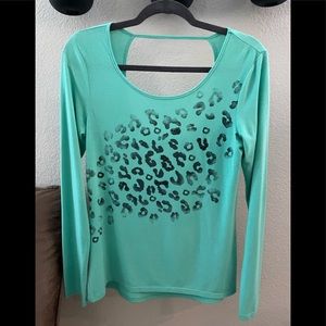 Green tee with black ombré leopard print! Cut out detail in back.